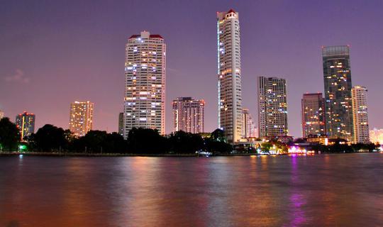 cover Luxury Living, Watching The Chao Phraya River Night Light at Chatrium Hotel Riverside Bangkok.