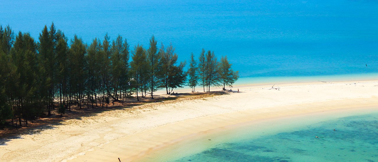 cover A short walk and a few waves later, we arrived at... Koh Kam Islands @ Ranong.