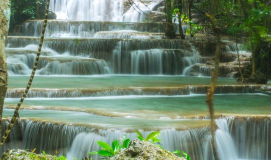 Cover With 500 baht in hand, one can float serenely at "Huai Mae Khamin"....