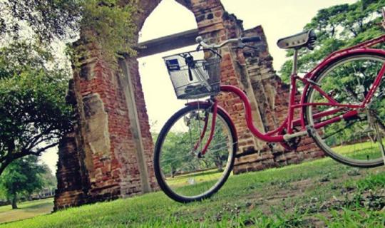 Cover Embark on a solo cycling adventure through the captivating ancient c...