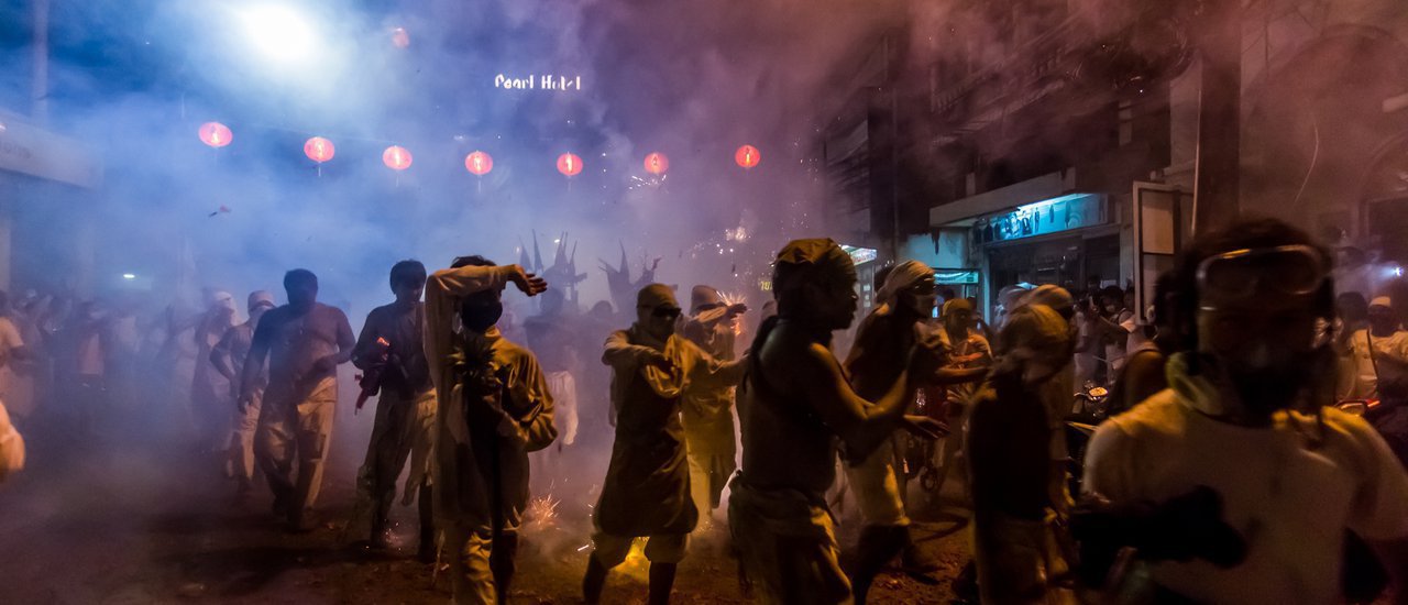 cover "Catch the hand thrower! At the 2016 Phuket Vegetarian Festival."