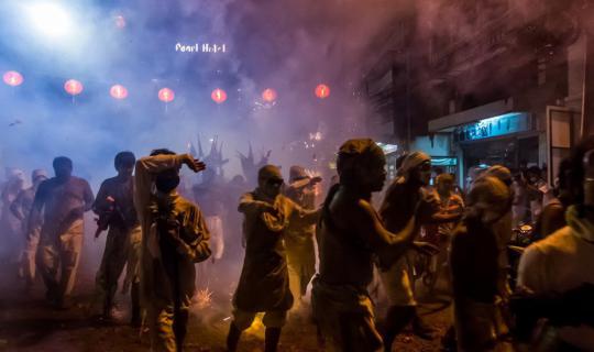 Cover "Catch the hand thrower! At the 2016 Phuket Vegetarian Festival."...