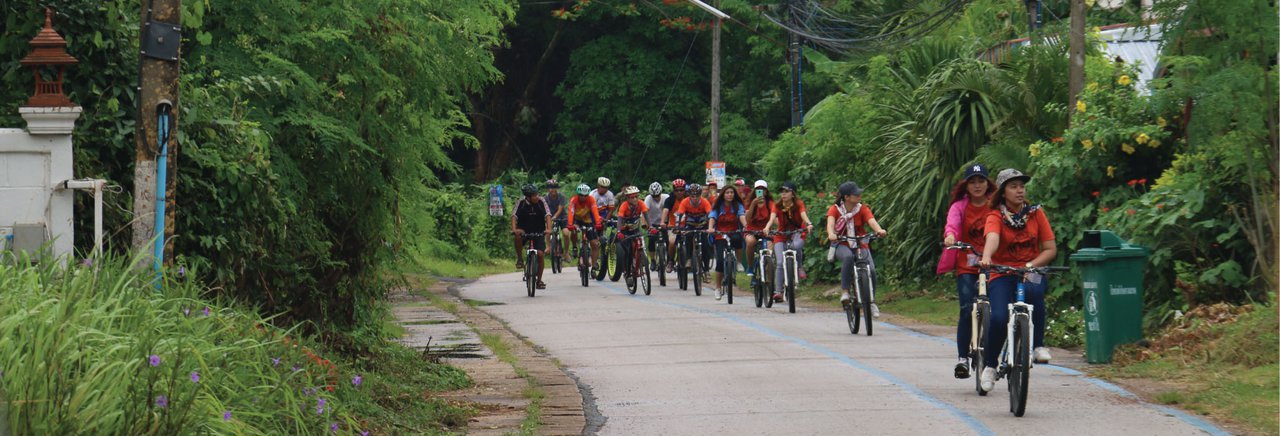 cover Volunteer to cycle to plant trees, take a leisurely walk along the Mekong River, and offer sticky rice alms in Chiang Khan.