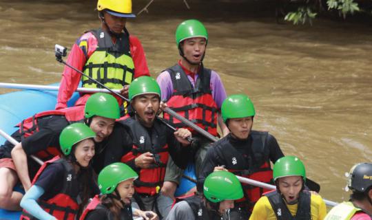 cover Whitewater rafting volunteers collect waste from the Nam Khek River, enjoying the breeze of Phu Hin Rong Kla National Park while trekking to find waterfalls.