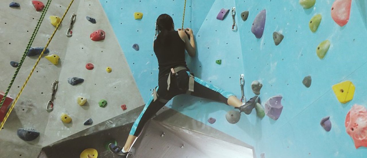 cover Adventure Activity: Let's Go Rock Climbing at Rock Domain Climbing Gym! 

This translates the original sentence while maintaining a simple and short tone. It also clarifies the meaning of "กิจกรรมวันหยุด" by specifying it as an "Adventure Activity."