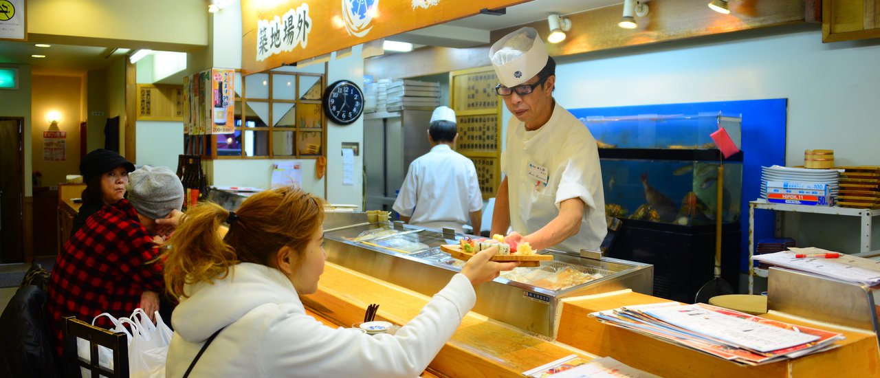 cover Waking up at four in the morning to explore the legendary Tsukiji Fish Market...