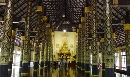 Cover Making merit at Khao Barchop Temple, Chanthaburi, amidst a serene na...