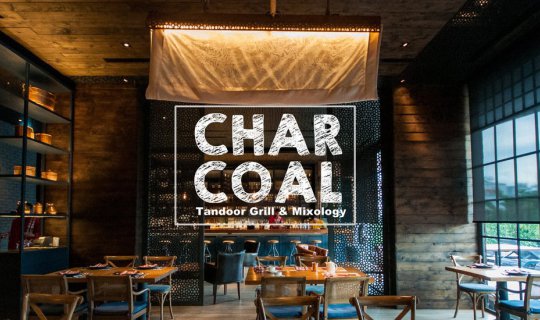 cover Experience the Authentic Flavors of Indian Cuisine at Charcoal Tandoor Grill & Mixology.