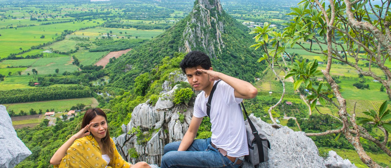 cover Conquering Khao No peak, then soaring to Khlong Lan Waterfall, returning with a sore backside after a 700 km one-day journey.