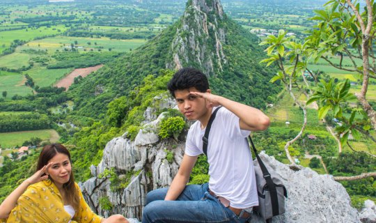 Cover Conquering Khao No peak, then soaring to Khlong Lan Waterfall, retur...