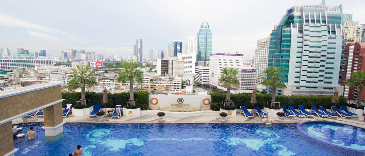 cover Lovely Stay at The Berkeley Hotel Pratunam and Night Tour at Silom and Train Night Market Ratchada.