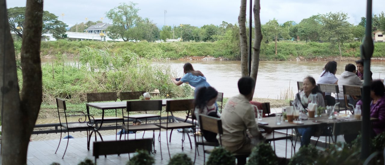 cover Enjoy a riverside meal at Melt in your Mouth, a trendy restaurant in Chiang Rai, Thailand, located along the banks of the Kok River.