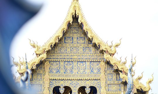 Cover Stop by to pay respects at Wat Rong Suea Ten, Chiang Rai Province. T...