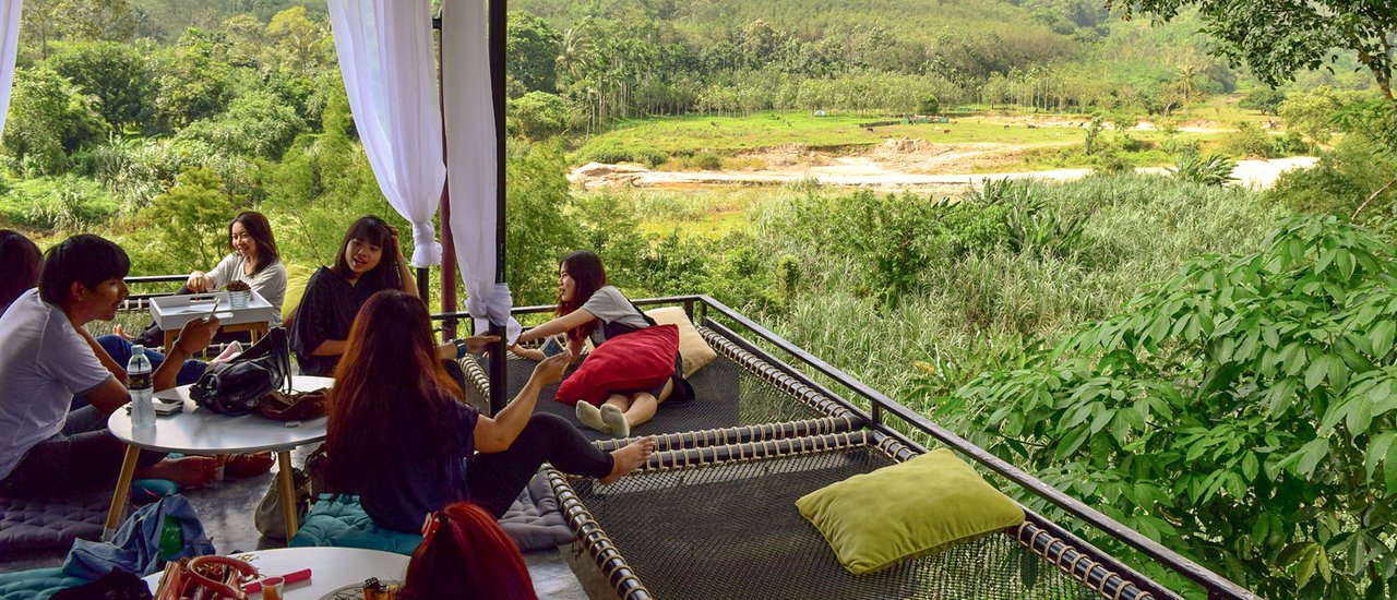 cover Relaxing on the net, enjoying the million-dollar view of nature at a small house in the valley.