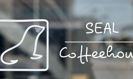 cover Sip coffee in style at S E A L CoffeeHouse.