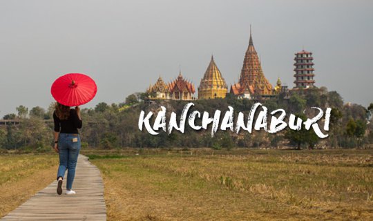 cover Exploring wildlife, visiting temples, strolling across bridges, and relaxing by the river in the charming city of Kanchanaburi.