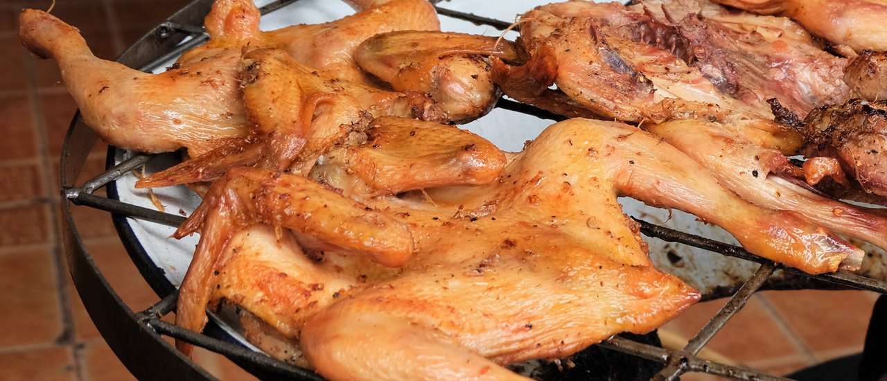 cover Grilled Chicken, Sticky Rice, and Papaya Salad at Rama 9 Grilled Chicken Restaurant.