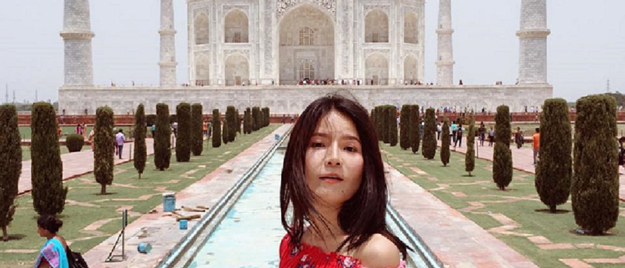 cover A woman traveling alone in India.