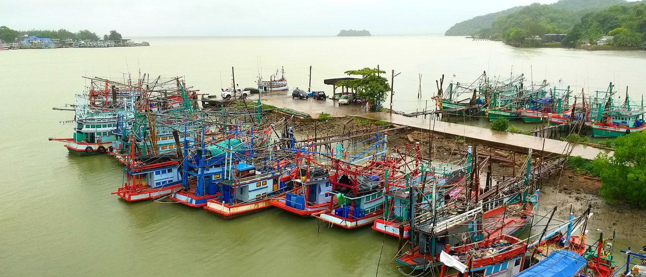 cover Ko Chang, Trat Province, on a drizzly day. The blue church is nearing completion.