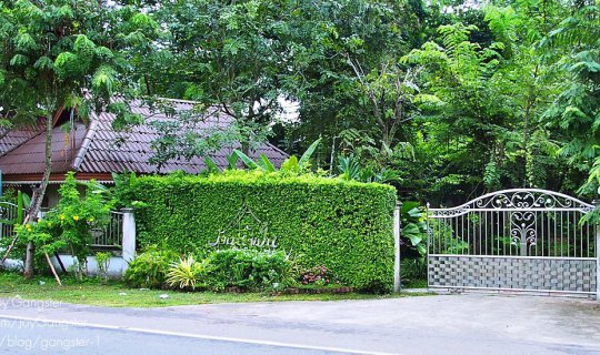 cover Baan Nam Pen Resort, Amphawa: A haven amidst lush greenery on the banks of the Mae Klong River.