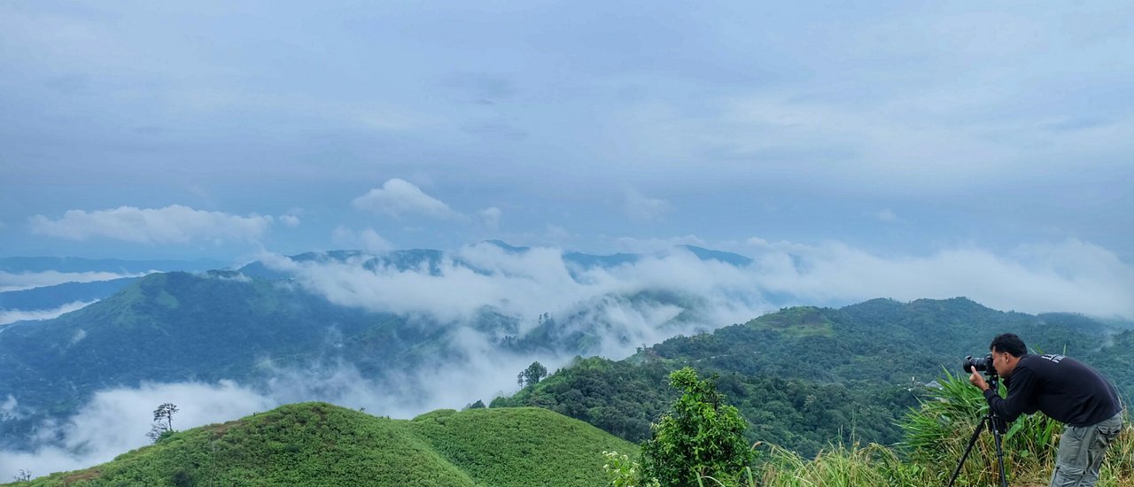 cover Ride a motorbike... to see the misty fog near Bangkok at Pilok.