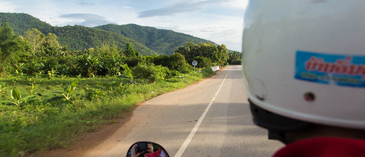 cover Ride a wave on Highway 211 along the Mekong River.