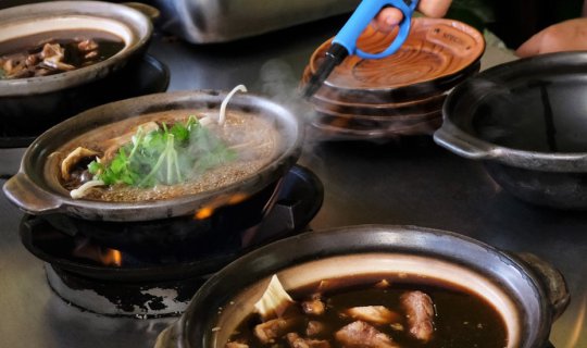 cover Enjoying delicious food in the city of Chumphon.