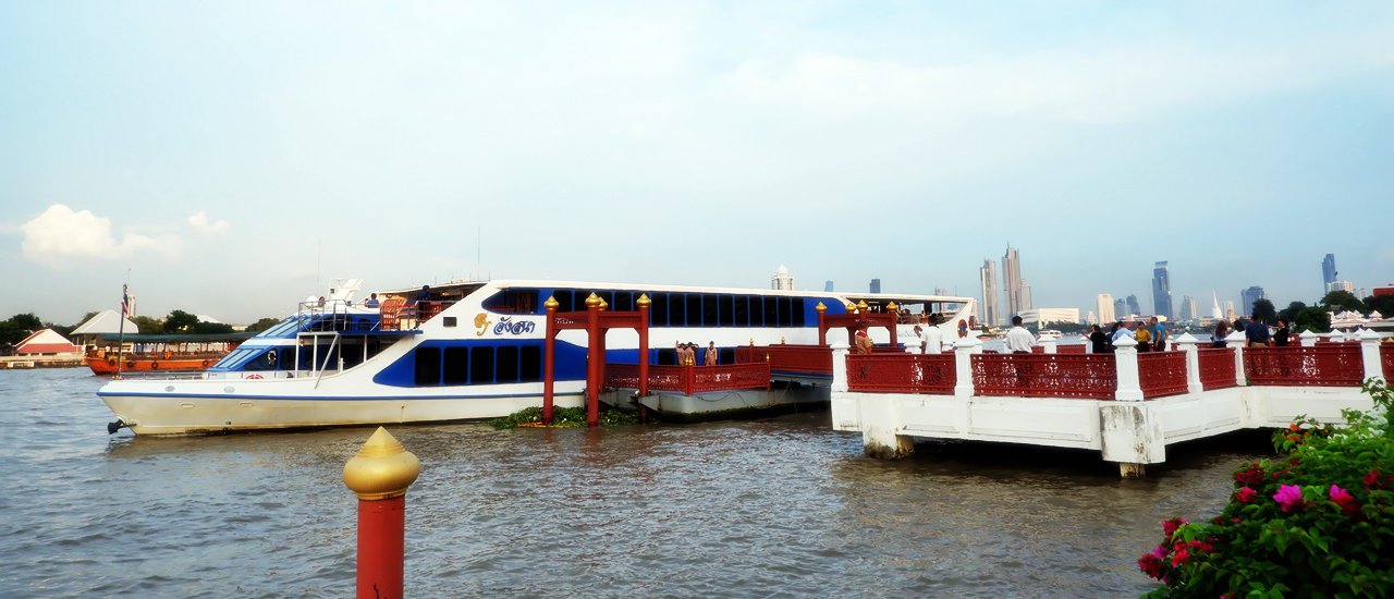 cover A scenic boat tour along the Chao Phraya River aboard the Angsana, a vessel operated by the Royal Thai Navy.