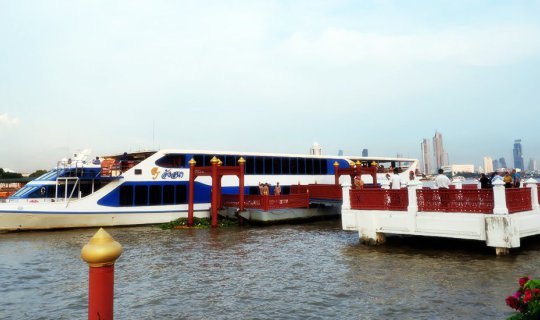 cover A scenic boat tour along the Chao Phraya River aboard the Angsana, a vessel operated by the Royal Thai Navy.