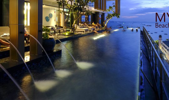 cover Mytt Beach Hotel, a newly opened hotel in Pattaya with a stunning swimming pool.
