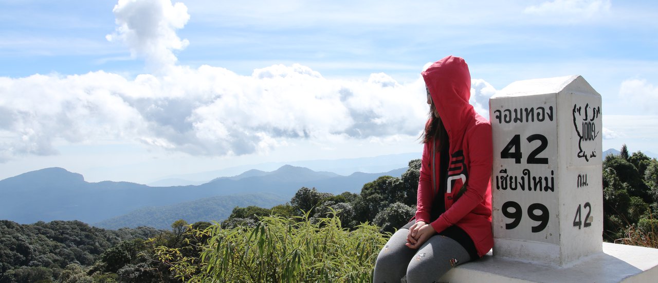 cover Venturing into the mist-shrouded forest, ascending to the mountain peak, wrapped in a blanket on a cloudy day. Episode 1: Doi Inthanon.