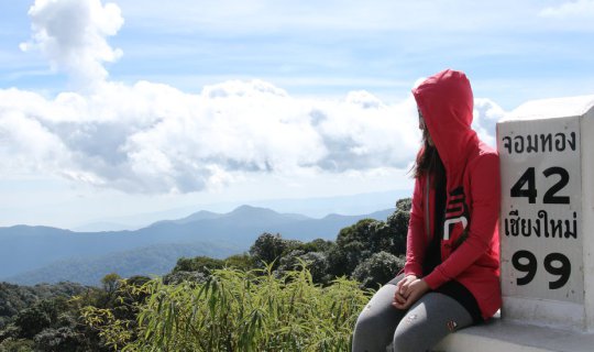 cover Venturing into the mist-shrouded forest, ascending to the mountain peak, wrapped in a blanket on a cloudy day. Episode 1: Doi Inthanon.