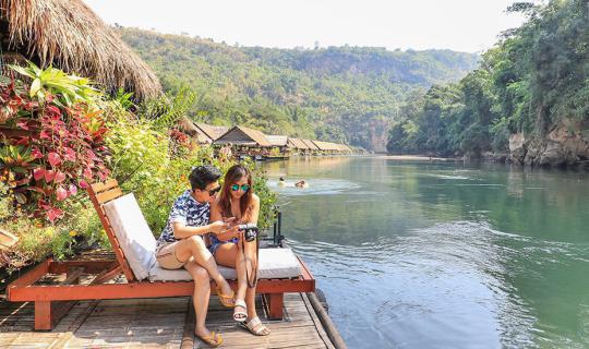 cover Slow Life by the River in Kanchanaburi (A Life on a raft house with no electricity but a lamplight and cold air)